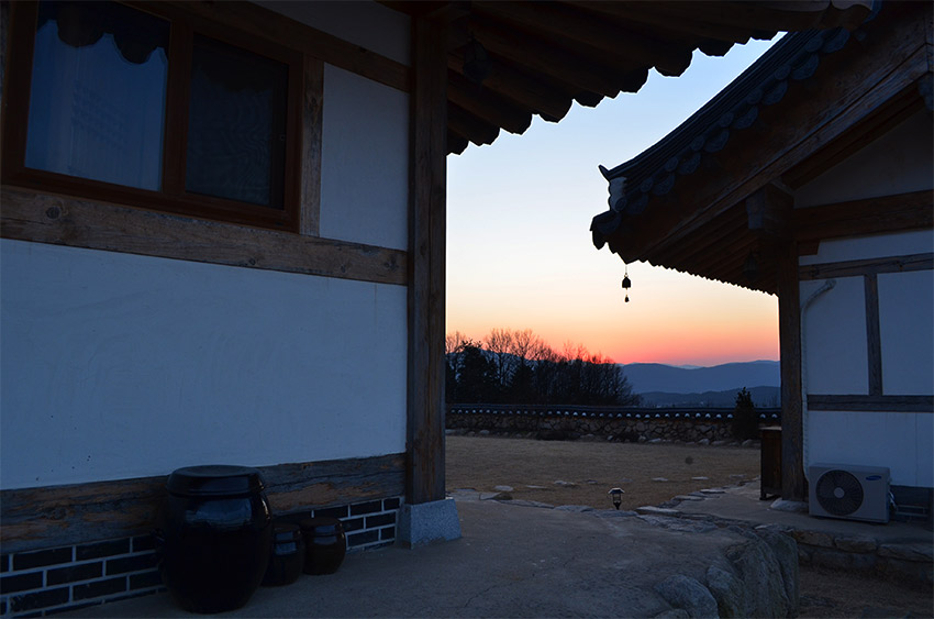Gyeongju sunset with hanok roofs
